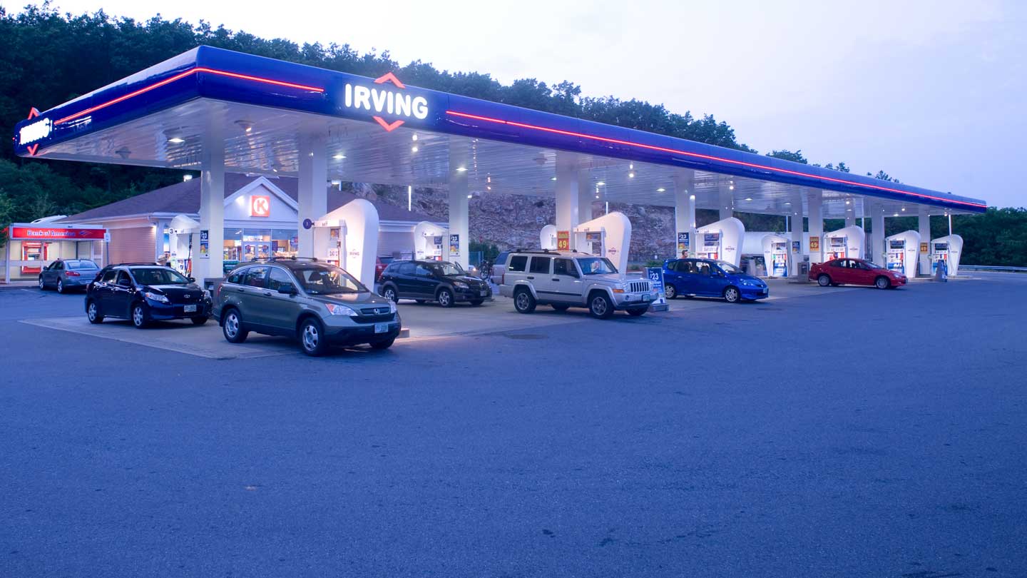 Customers fueling their vehicles on Irving Oil gas station 